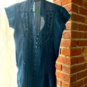 Blue sleeveless blouse